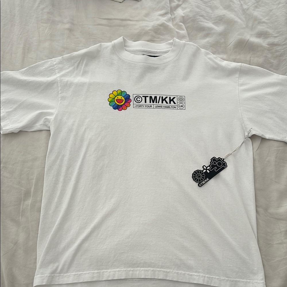 White Graphic T-Shirt with Colorful Flower Design